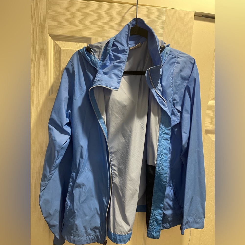 Women’s size large Columbia bright blue rain jacket w/ hood